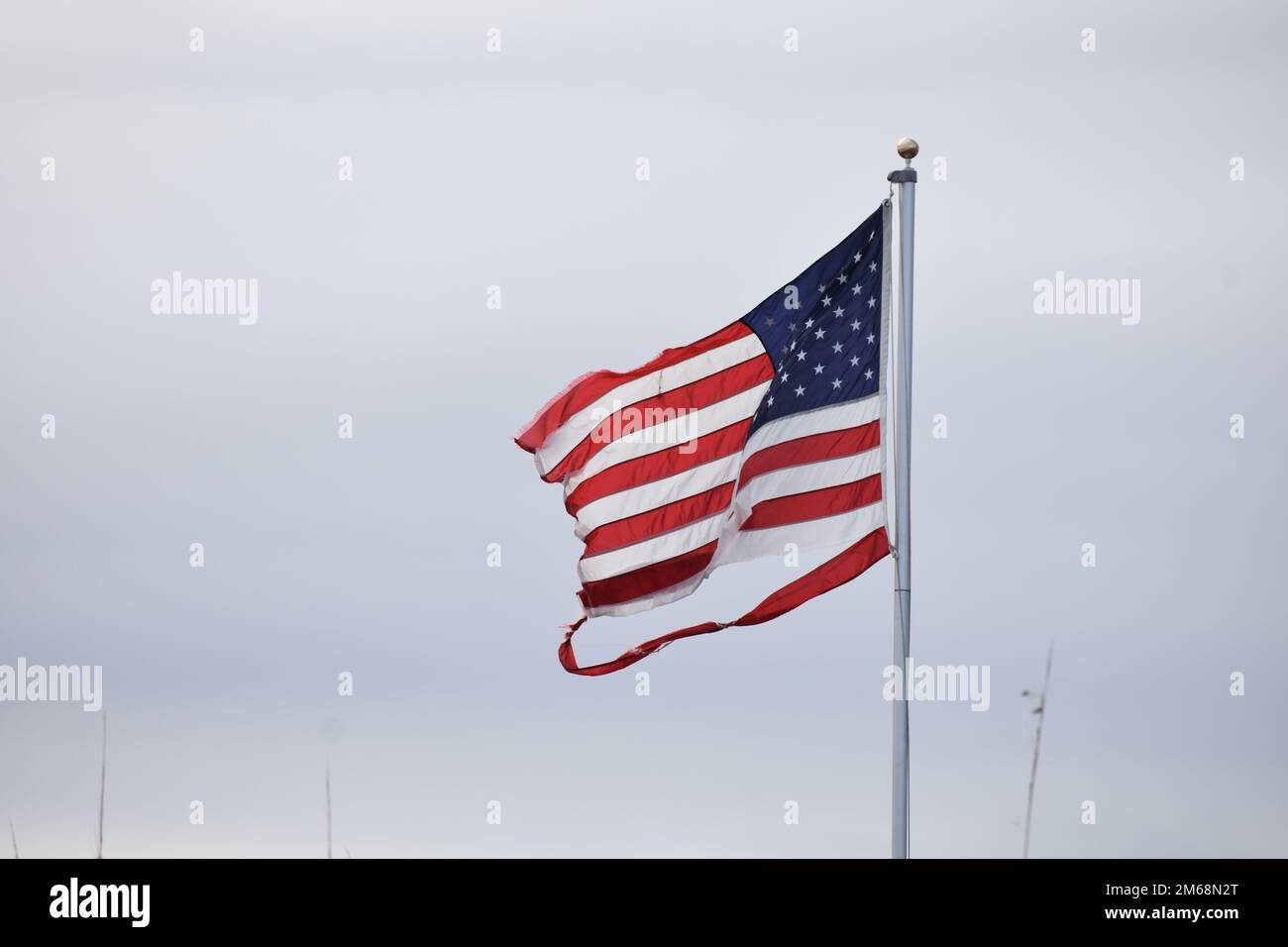Torn American flag Stock Photo