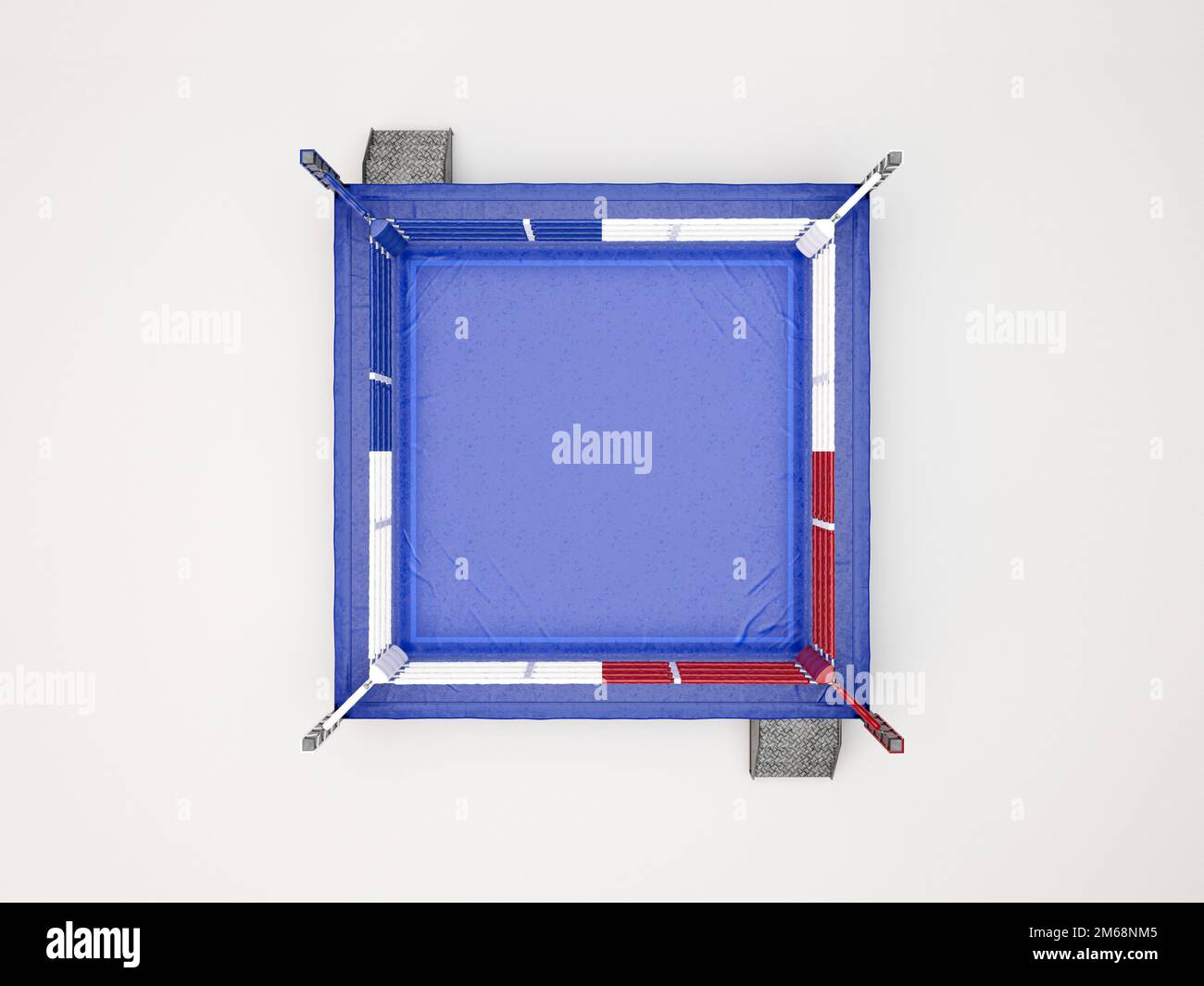 A modern regulation sized boxing ring with opposing blue and red ...