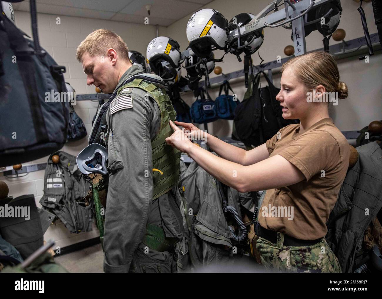 Aircrew Survival Equipmentman 3rd Class Kimberly Turner, right, and Lt