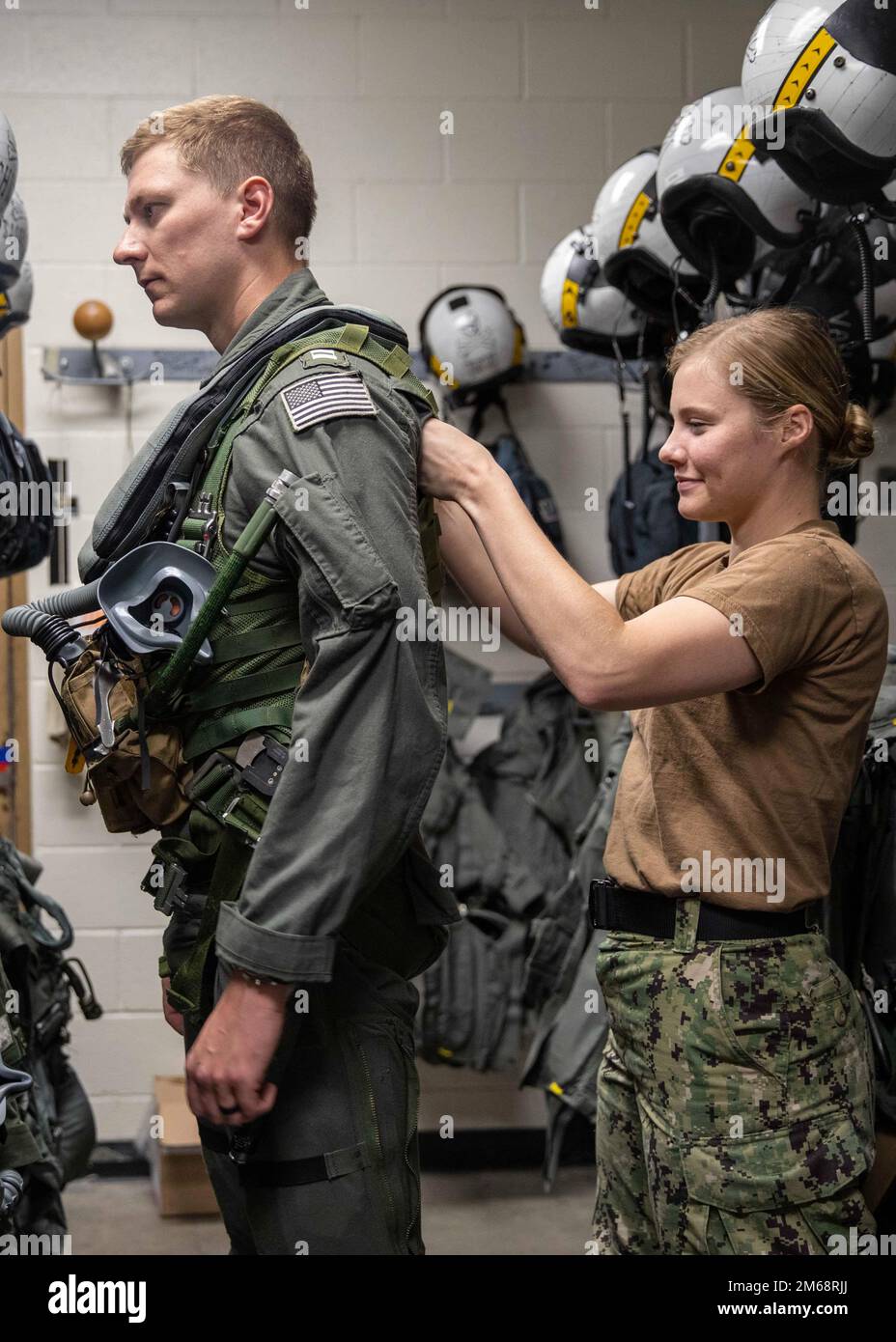 Aircrew Survival Equipmentman 3rd Class Kimberly Turner, right, and Lt