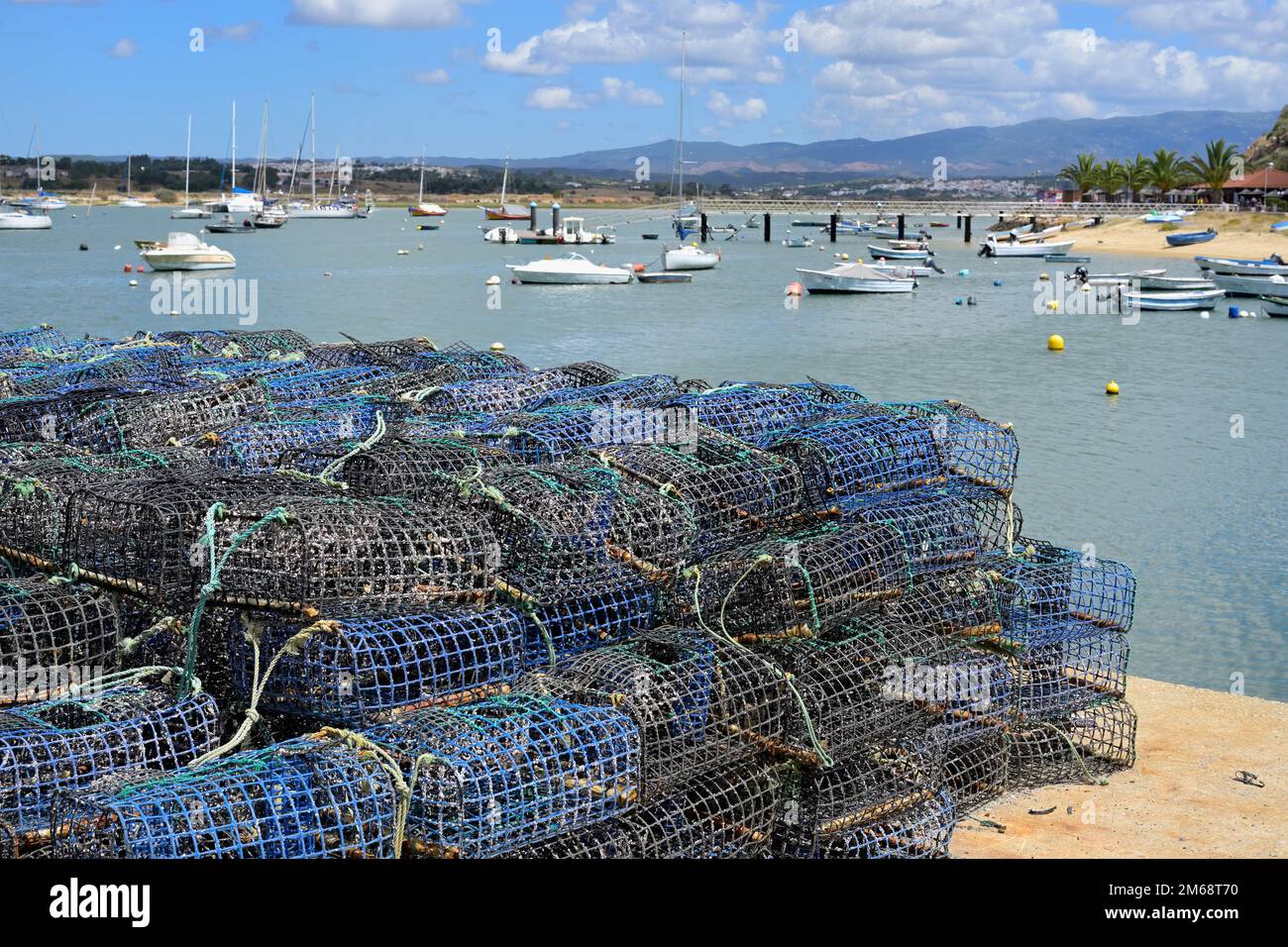 Basket fish traps for crab and lobster fishing in the Atlantic Ocean, Alvor fishing harbour,  Portimao municipality, Algarve, Portugal Stock Photo