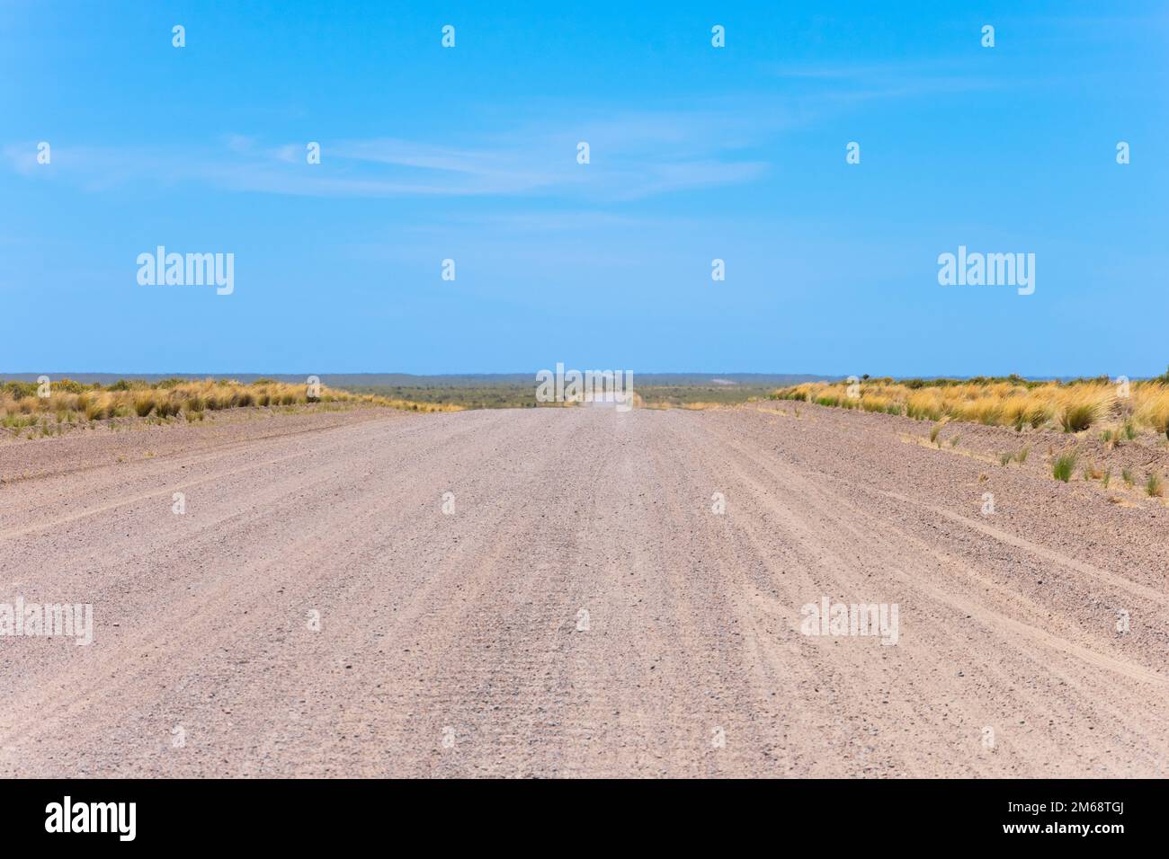 Gravel road in Peninsula Valdes, Province of Chubut, Argentina Stock Photo