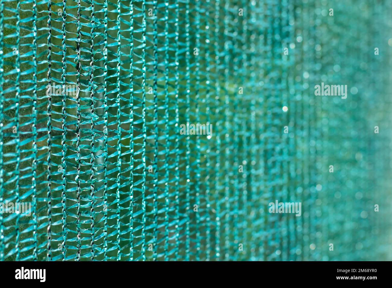 Knitted polyethylene mesh background, sun protection material that