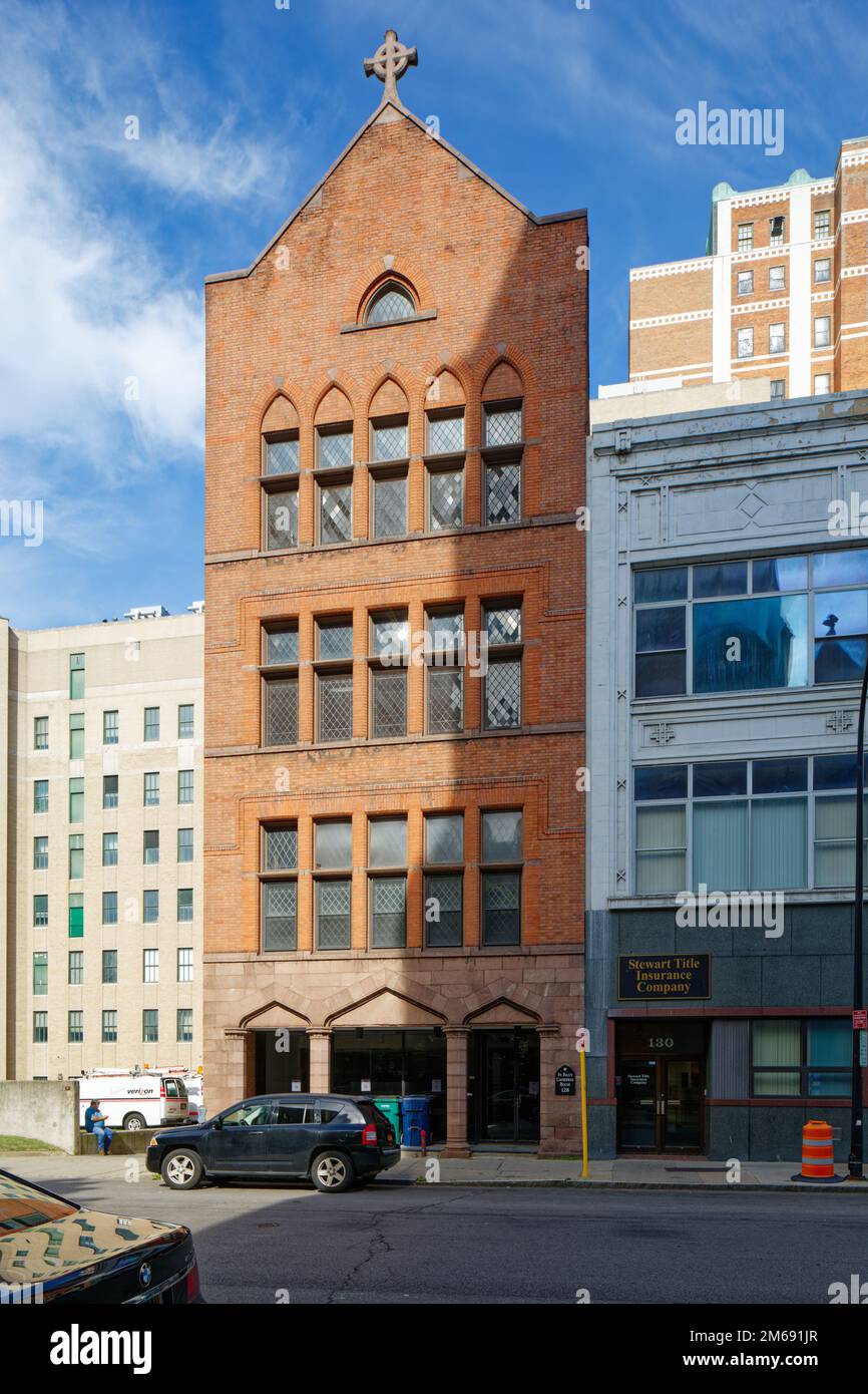 St. Paul’s Cathedral House, 128 Pearl Street, was converted to rental apartments in 2018 and is now known as Cathedral Commons Apartments. Stock Photo