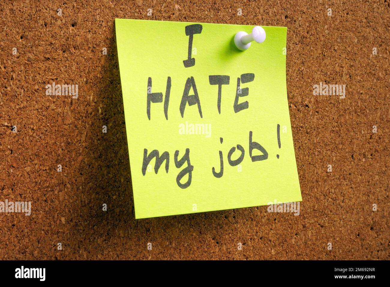 Pinned sticker with inscription I hate my job. Stock Photo