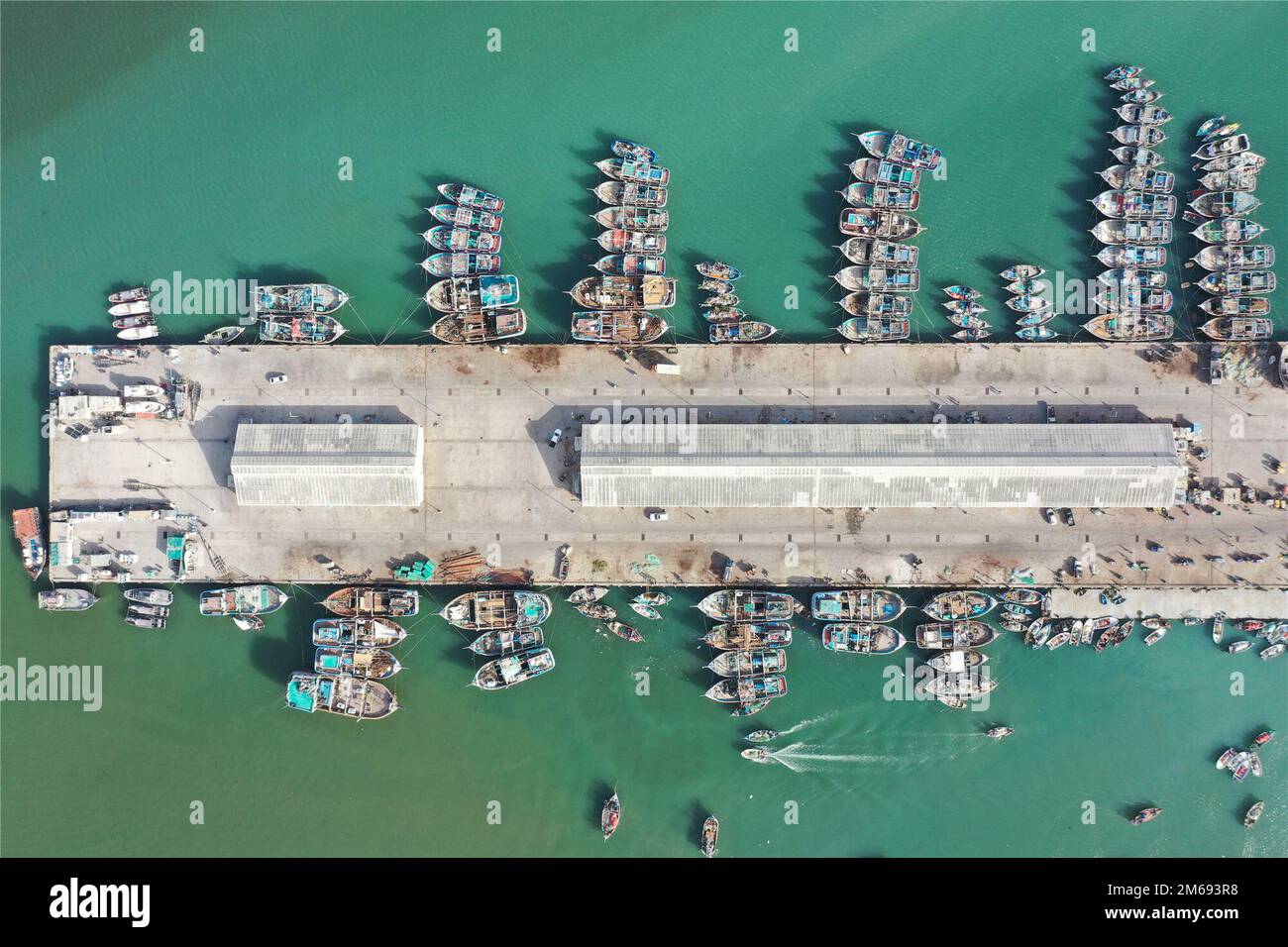 Islamabad. 4th June, 2022. This aerial photo taken on June 4, 2022 shows a port for fishermen in Gwadar of Pakistan's southwest Balochistan Province. TO GO WITH 'Interview: Pakistan-China year of tourism to greatly boost tourism cooperation, says Pakistani official' Credit: Jiang Chao/Xinhua/Alamy Live News Stock Photo