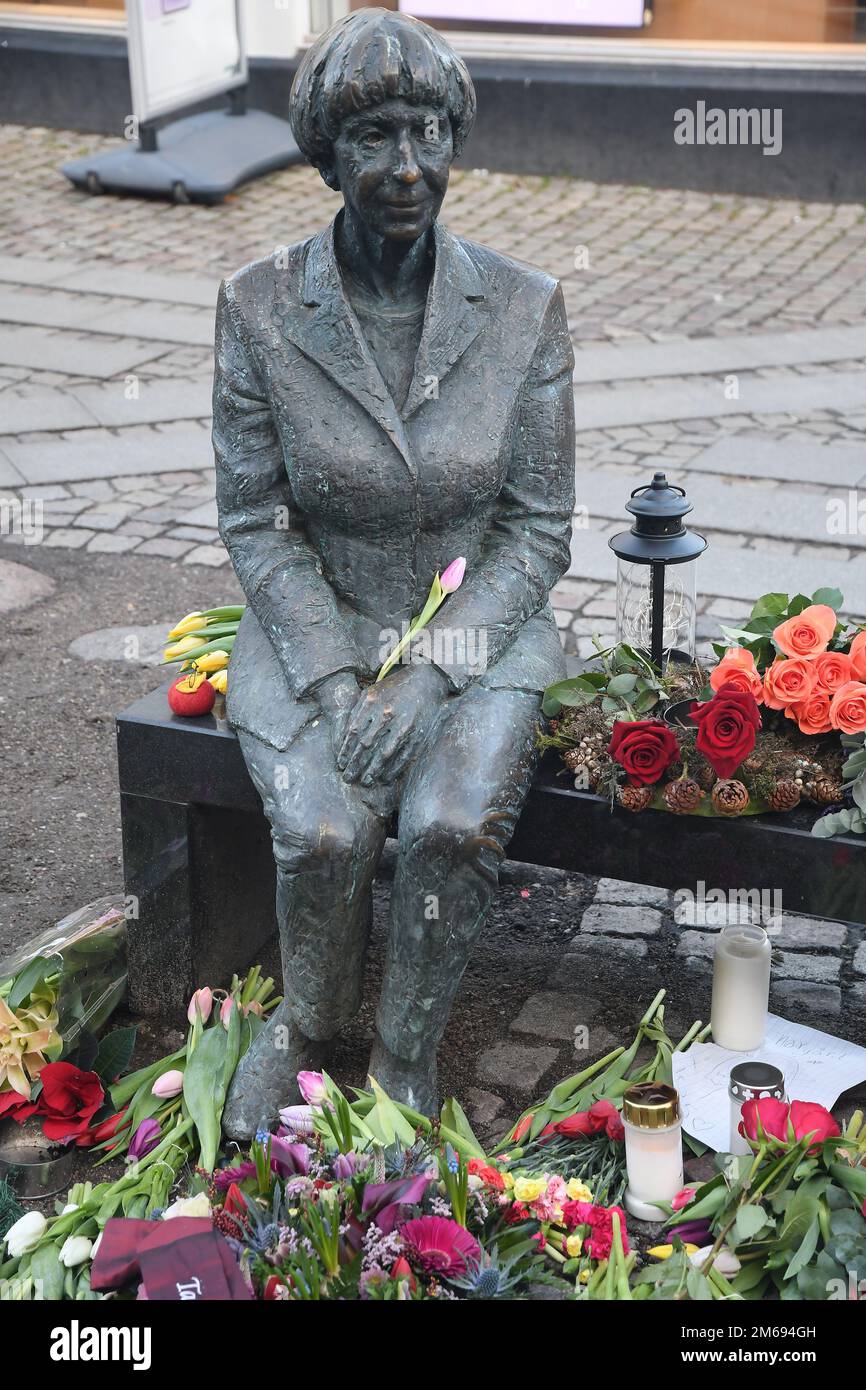 Roskilde/Denmark/03 January 2023/ Danish writer and joiur aist Ms.Lise Norgaard died at 105  age in Copenhaen Denamrk and people photograph flowers aned her statue she started journsit at local news papers to top danish news paprs .  (Photo. Francis Joseph Dean/Dean Pictures) Stock Photo