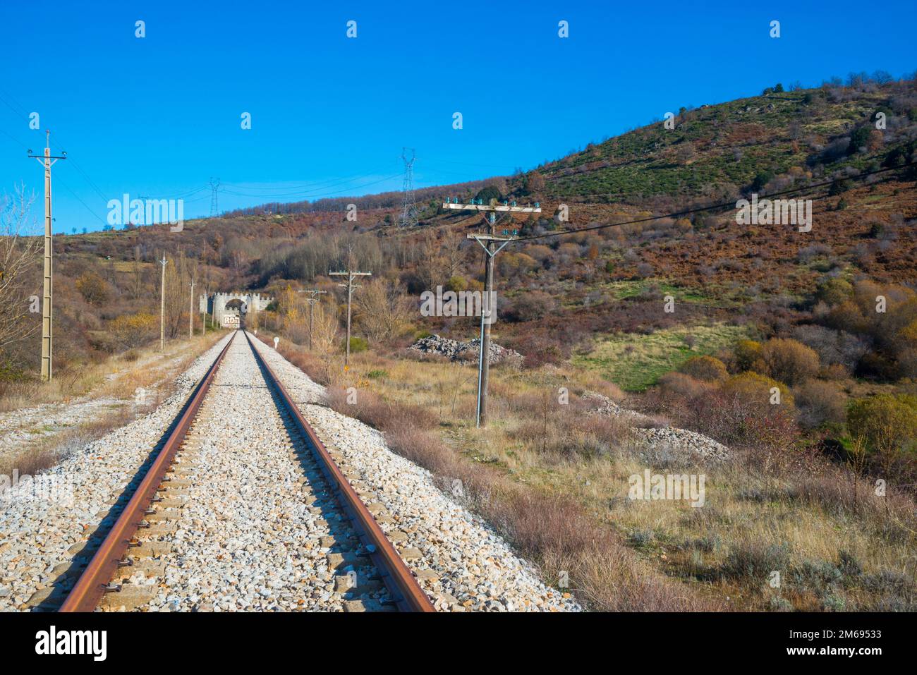 Tracks, old Madrid-Burgos railway. Robregordo, Madrid province, Spain. Stock Photo