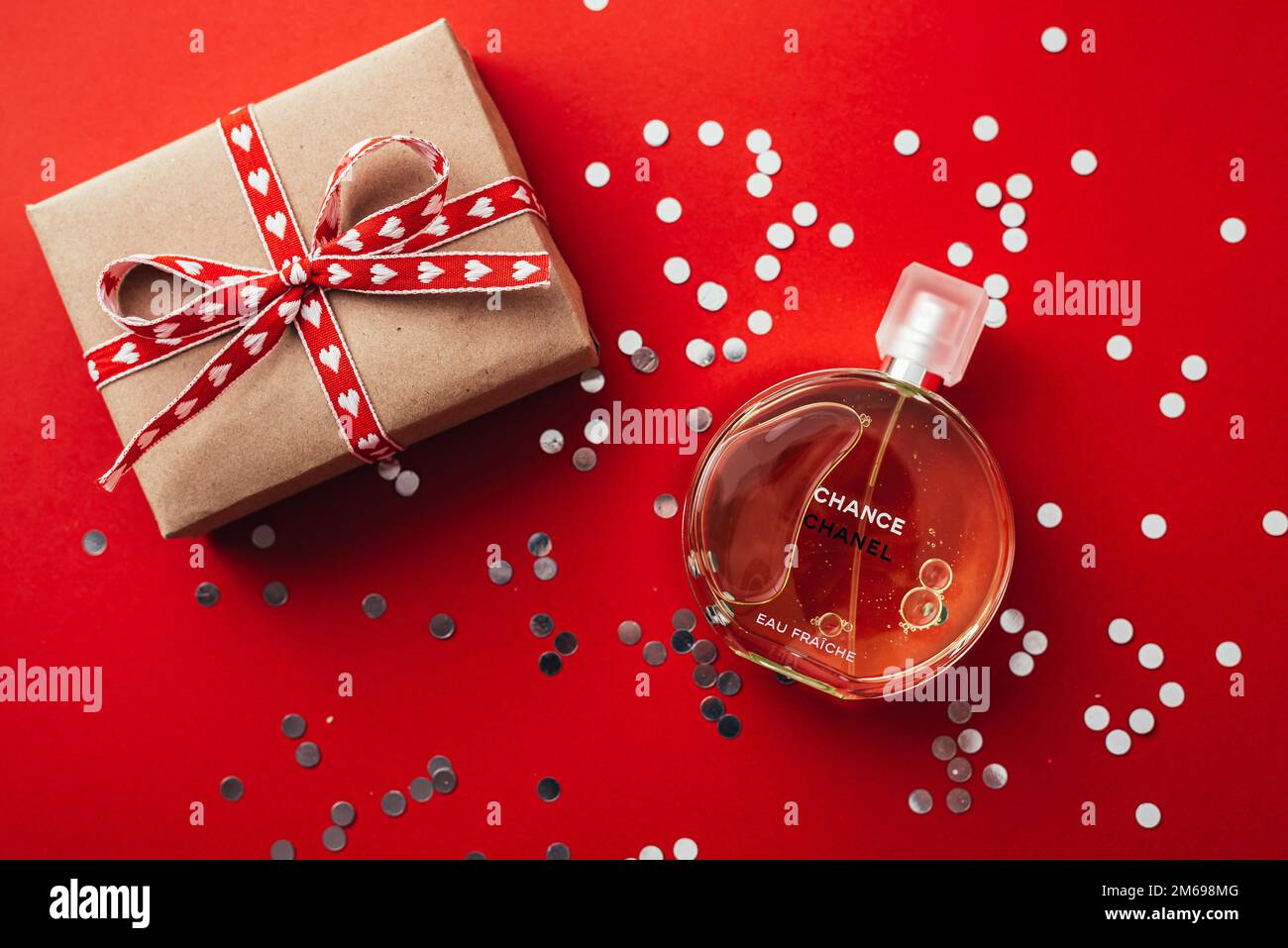 Kyivv, UKRAINE - January, 2023: Chanel Perfume and gift box on red