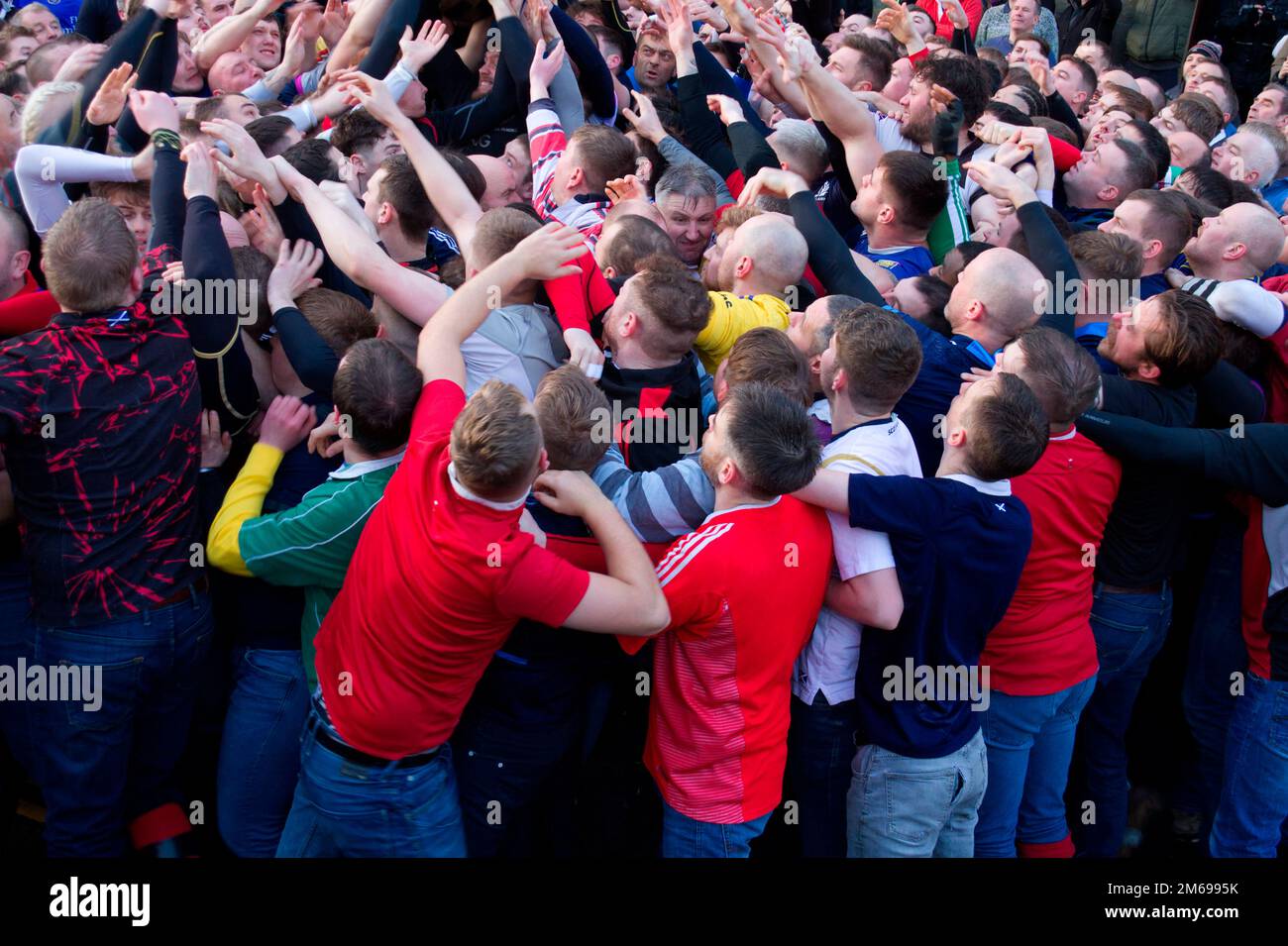 Catching the Ba, New Year street game, Orkney Stock Photo