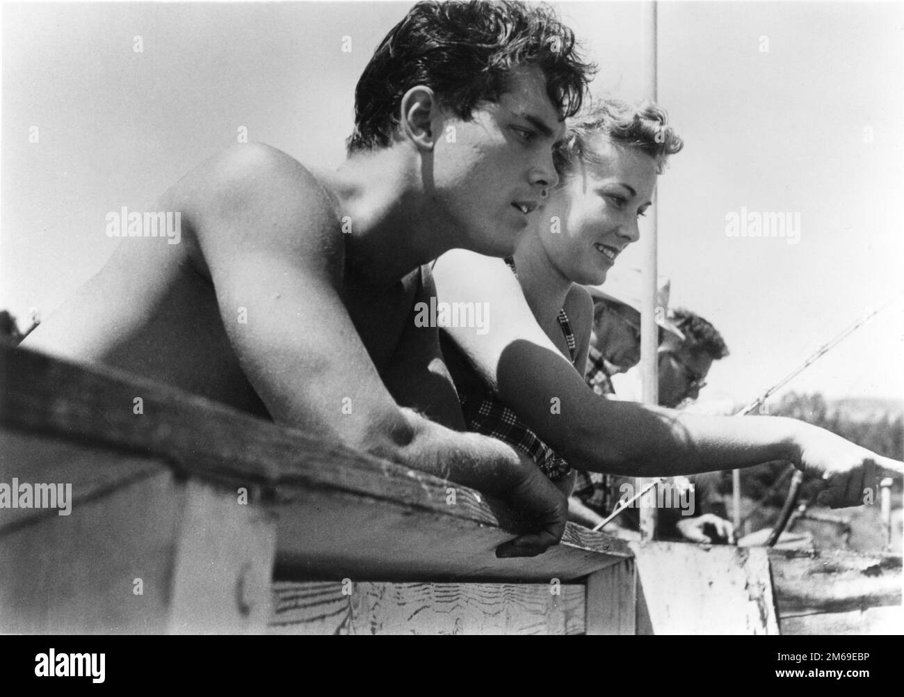 JEFFREY HUNTER and VERA MILES on set location candid during filming of THE SEARCHERS 1956 director JOHN FORD novel Alan Le May screenplay Frank S. Nugent music Max Steiner executive producer Merian C. Cooper C.V. Whitney Pictures / Warner Bros. Stock Photo