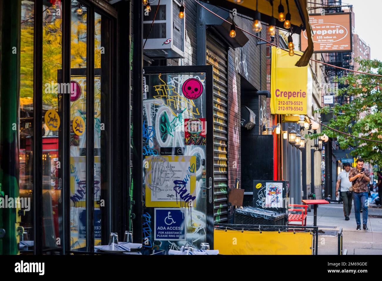 Street with bars and restaurants in The Bowery, a historic neighbourhood in the Lower East Side