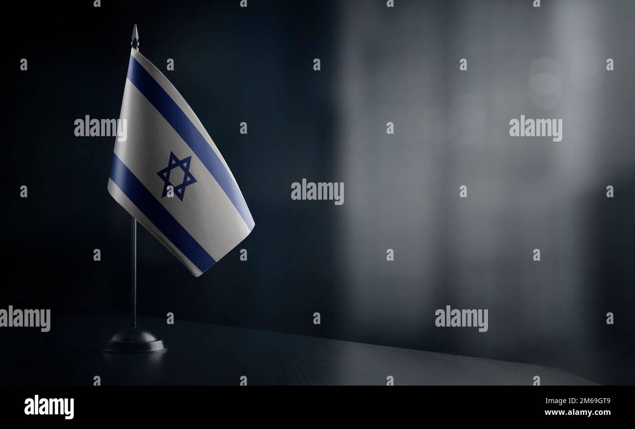 Small national flag of the Israel on a black background. Stock Photo
