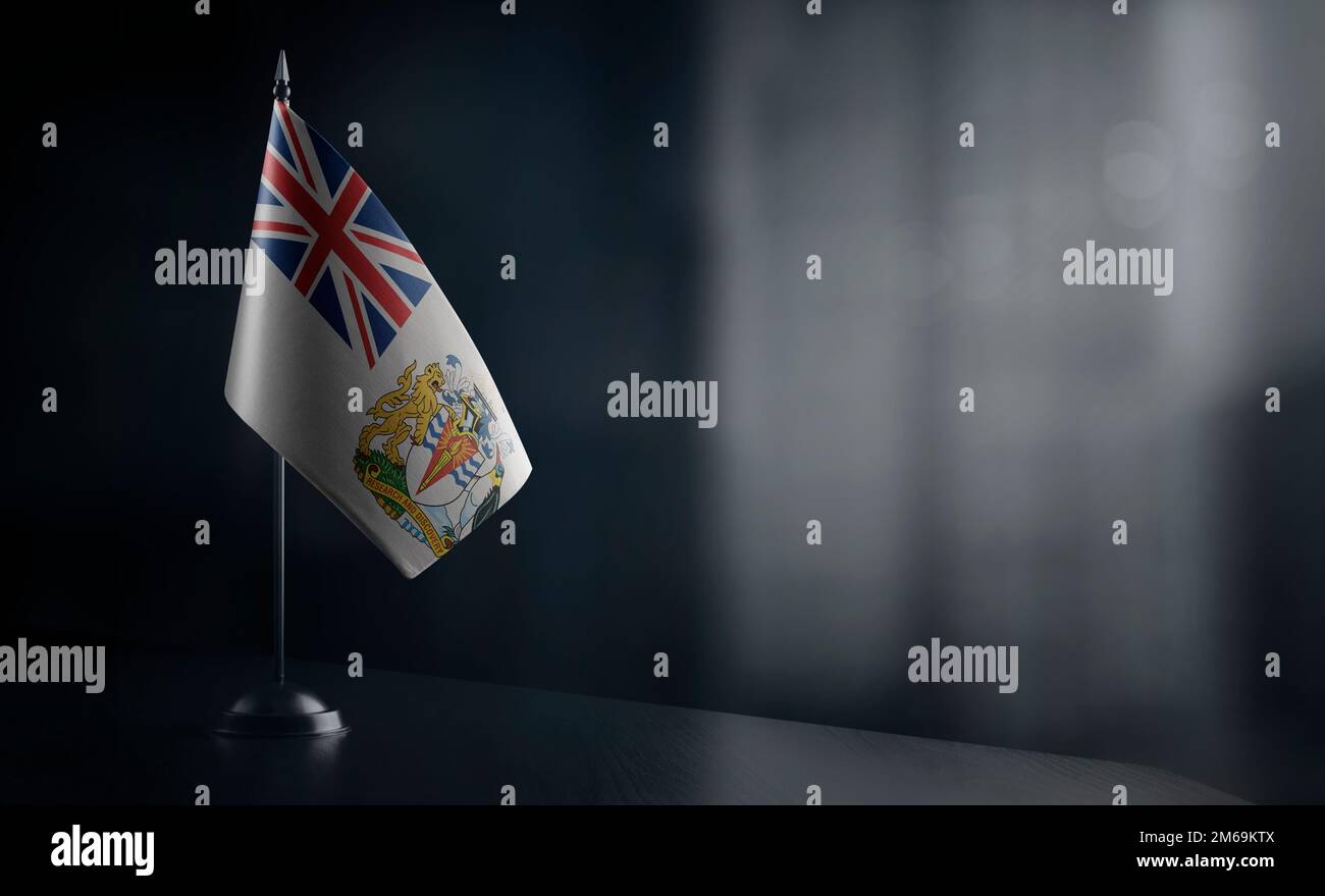 Small national flag of the British Antarctic Territory on a black background. Stock Photo