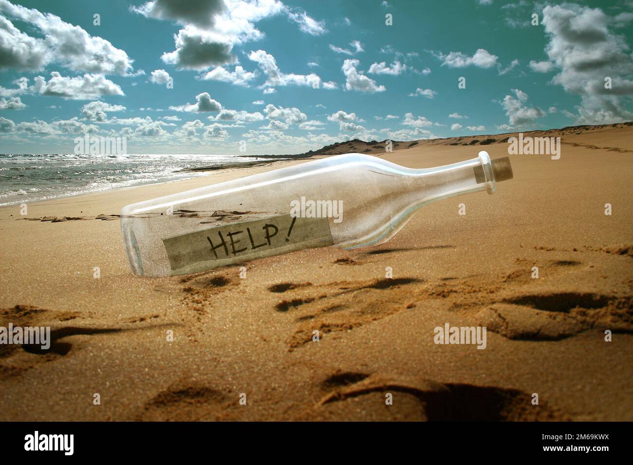 Help message in a bottle Stock Photo