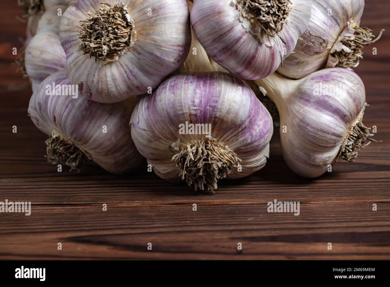 Garlic Cloves and Bulb on vintage wooden boards Stock Photo - Alamy