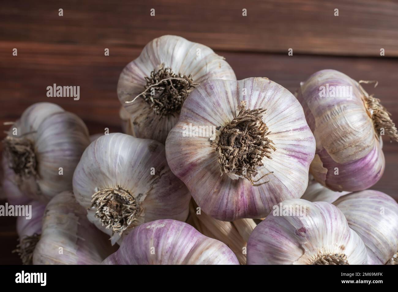 Garlic Cloves and Bulb on vintage wooden boards Stock Photo - Alamy