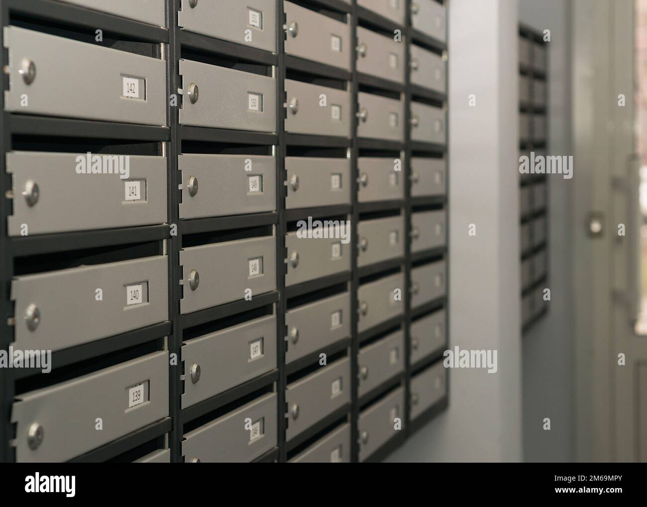 Mailboxes Filled With Numbers. In An Apartment Building 3 Stock Photo 