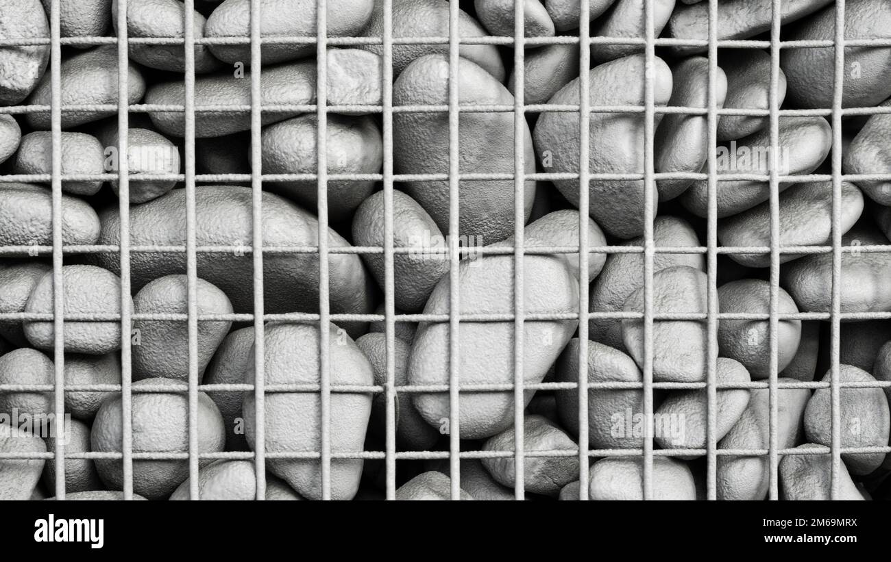 Texture background stones under the metal grid. Natural pattern Stock Photo