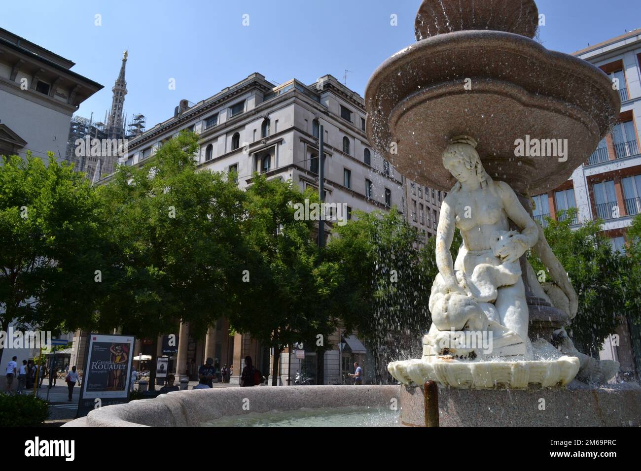 Panoramic view of the beautiful fountain of the three sirens in white marble in Milan on a sunny summer day. Stock Photo