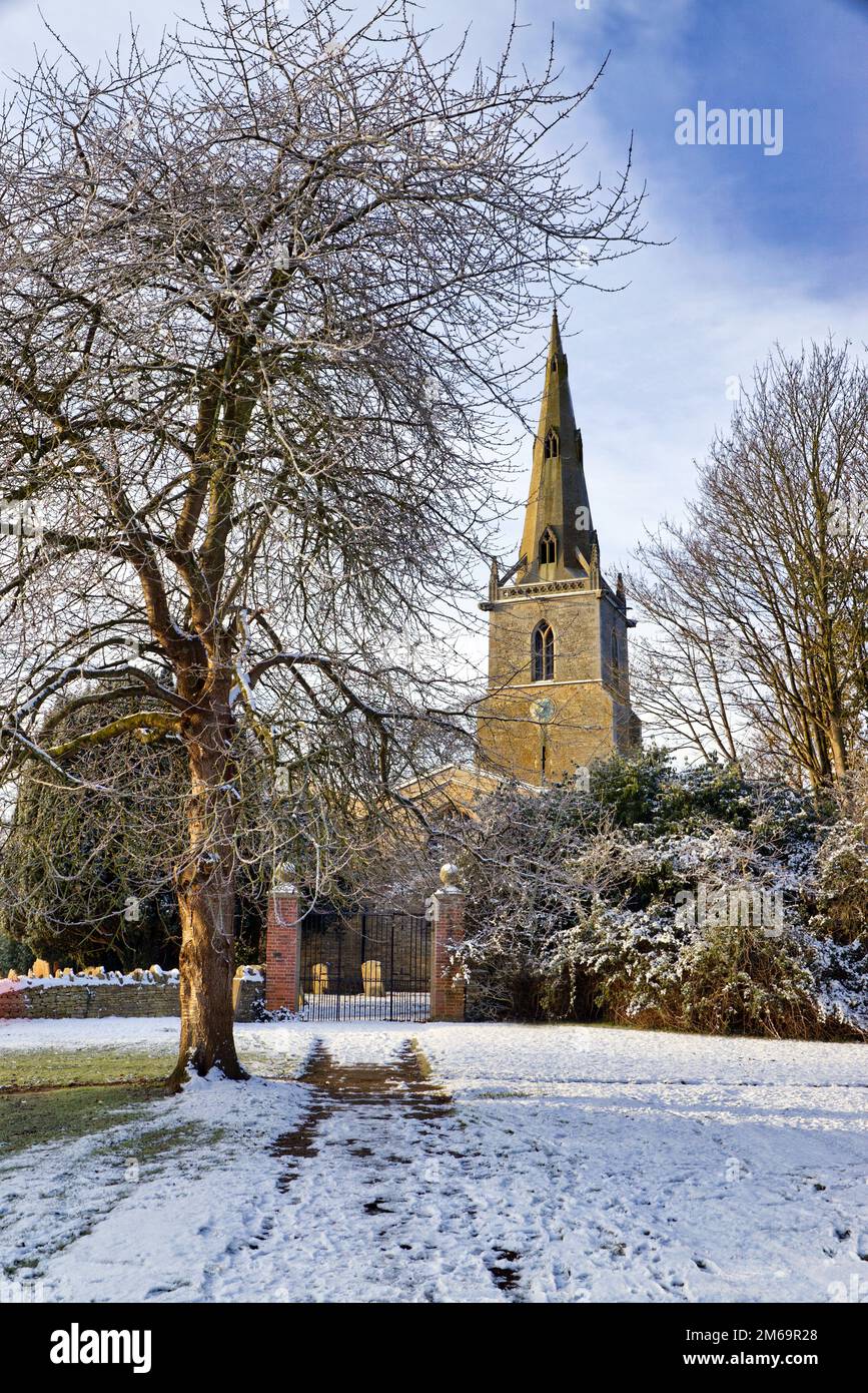 Bedfordshire, England, UK - Entrance to St Peter's Church in St Peter's Close, Sharnbrook village after winter snow Stock Photo