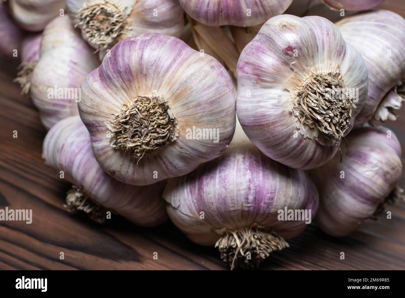 Garlic Cloves and Bulb on vintage wooden boards Stock Photo - Alamy