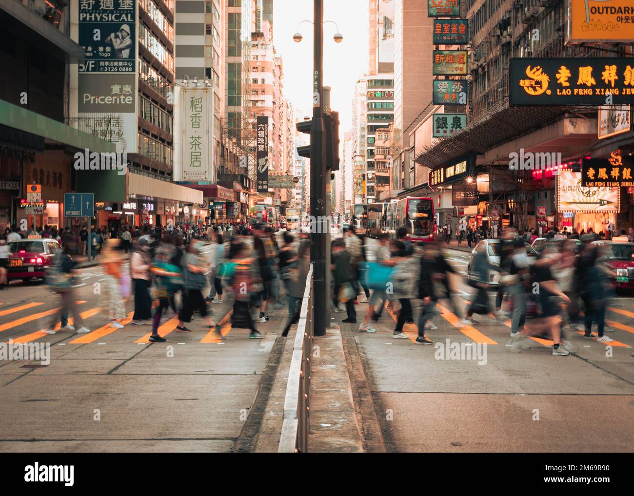 Pedestrians walking in Mong Kong in Hong Kong Stock Photo