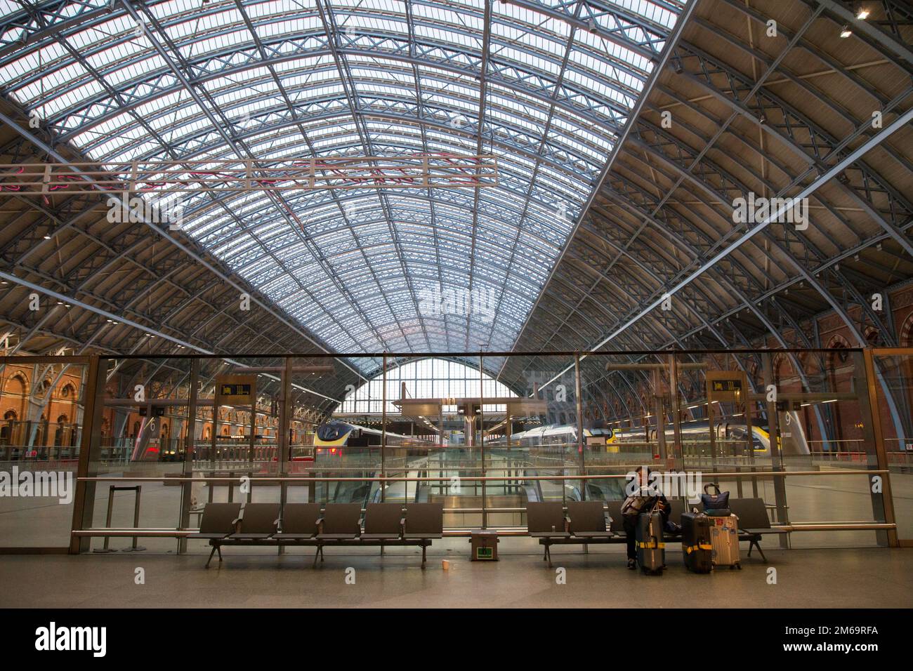St Pancras Station London Euro Star Terminal with a lone passenger Stock Photo