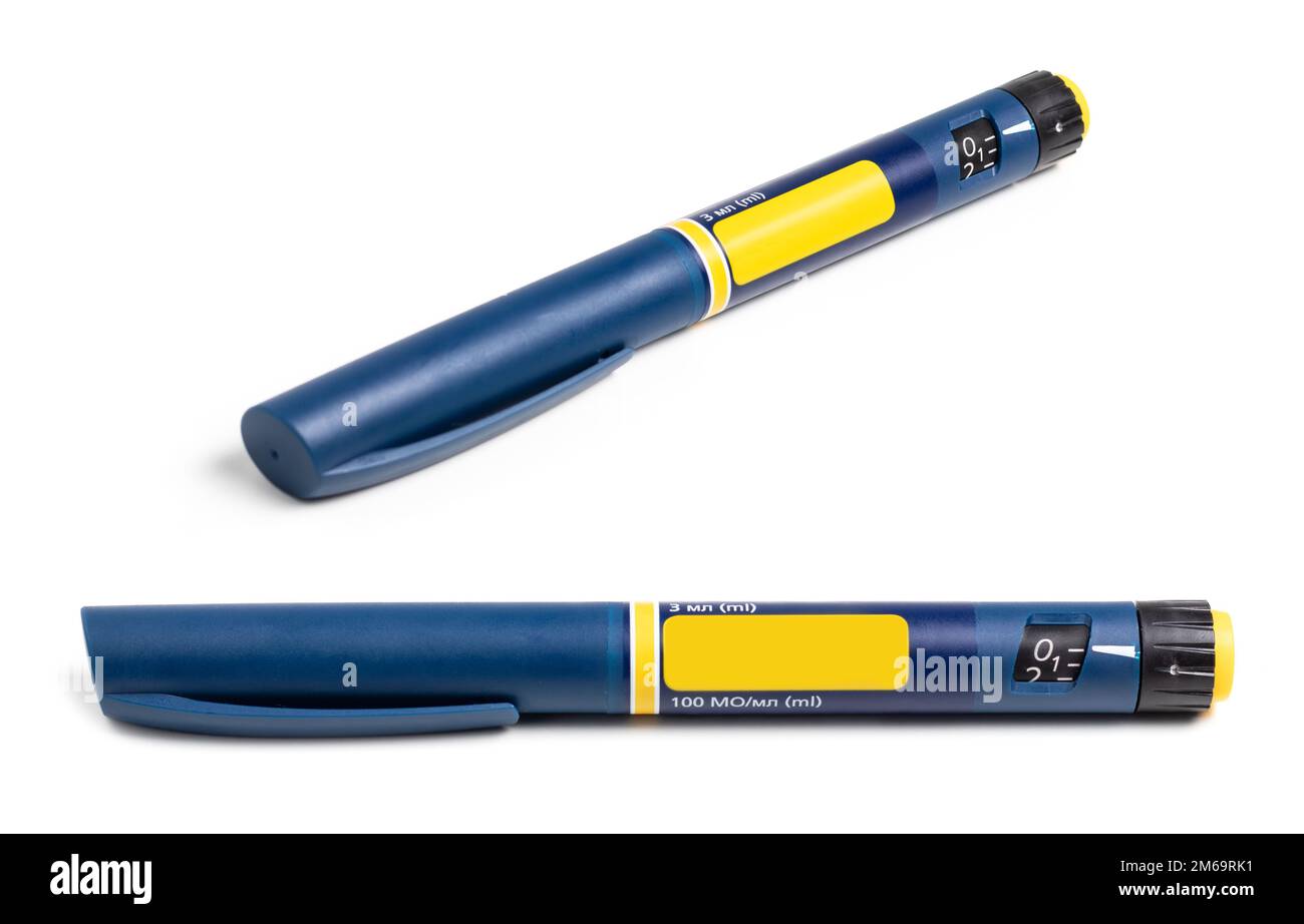 Insulin pen with insulin drop at needle tip isolated on white