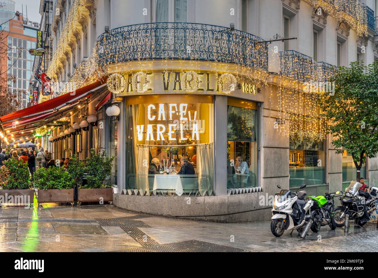 Cafe Varela adorned with Christmas lights, Madrid, Spain Stock Photo