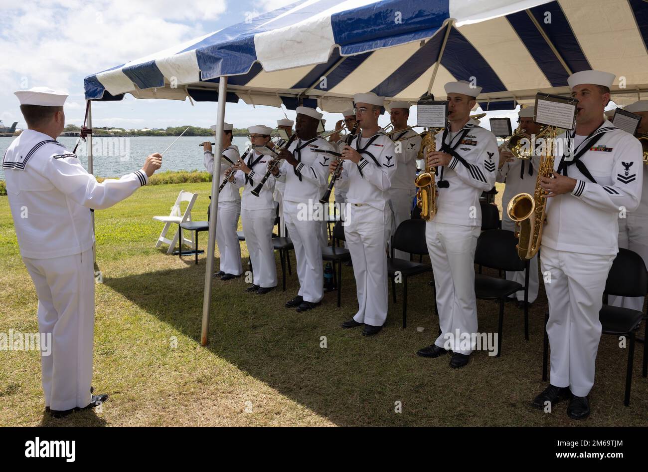220421-N-XM133-0018 EWA BEACH, Hawaii (April 21, 2022) Sailors with the U.S. Pacific Fleet Band perform during the change of command ceremony, April 21, 2022. Capt. John S. Barsano relieved Capt. Brett Thompson as commander, Navy Munitions Command Pacific East Asia Division during the official ceremony. Stock Photo