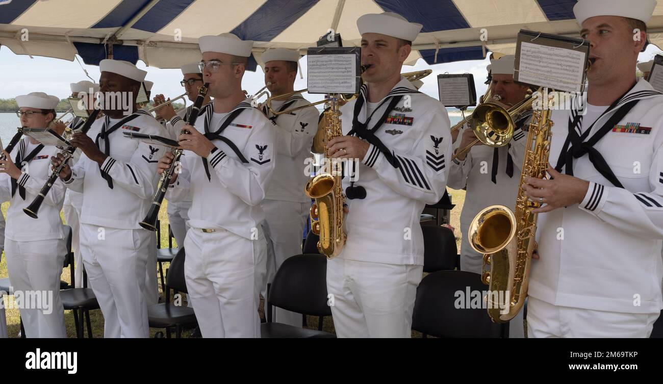220421-N-XM133-0019 EWA BEACH, Hawaii (April 21, 2022) Sailors with the U.S. Pacific Fleet Band perform during the change of command ceremony, April 21, 2022. Capt. John S. Barsano relieved Capt Brett Thompson as commander, Navy Munitions Command Pacific East Asia Division during the official ceremony. Stock Photo