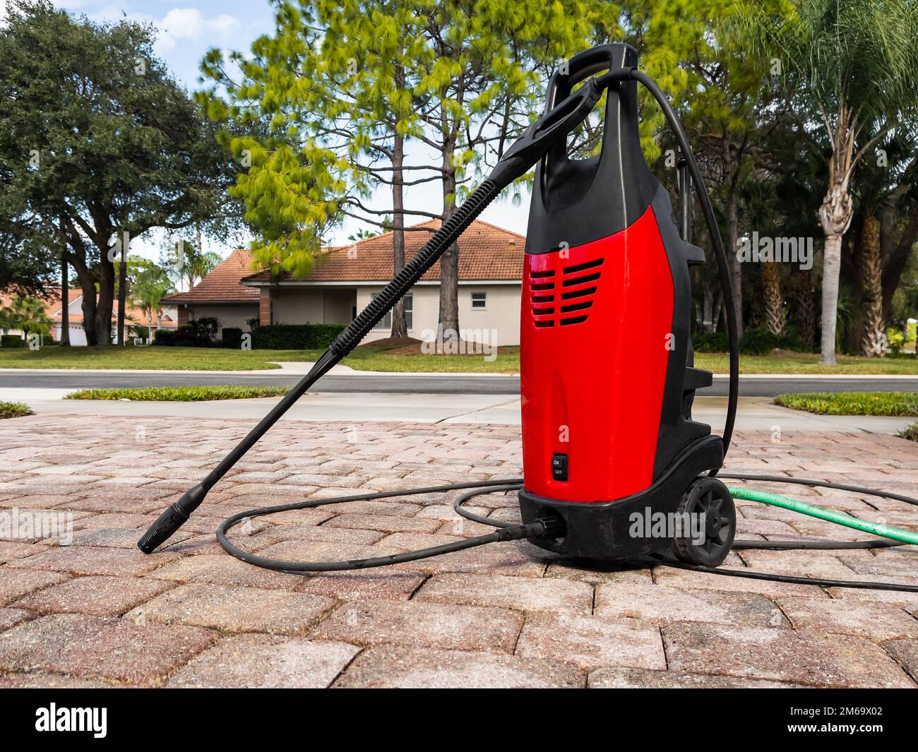 Electric powered pressure washer. Power wash cleaning service equipment. Stock Photo