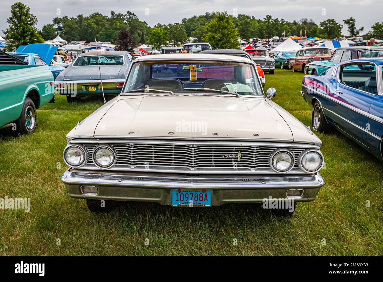 Iola, WI - July 07, 2022: High perspective front view of a 1964 Ford Galaxie 500 XL 2 Door Hardtop at a local car show. Stock Photo