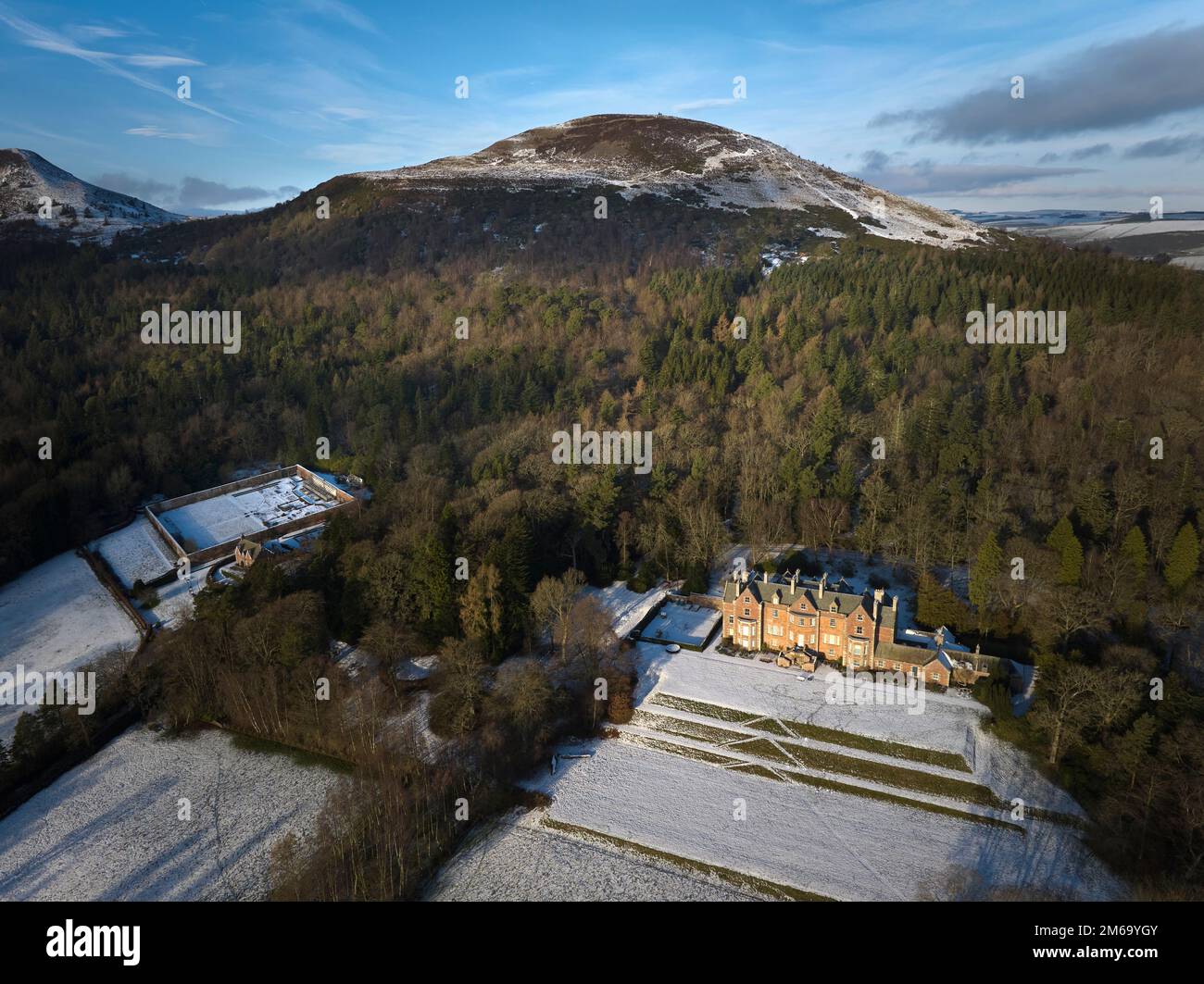 Aerial view of Eildon Hall residence of the Earl of Dalkeith nestling on the south side of The Eildon Hills on a crisp December day. Stock Photo