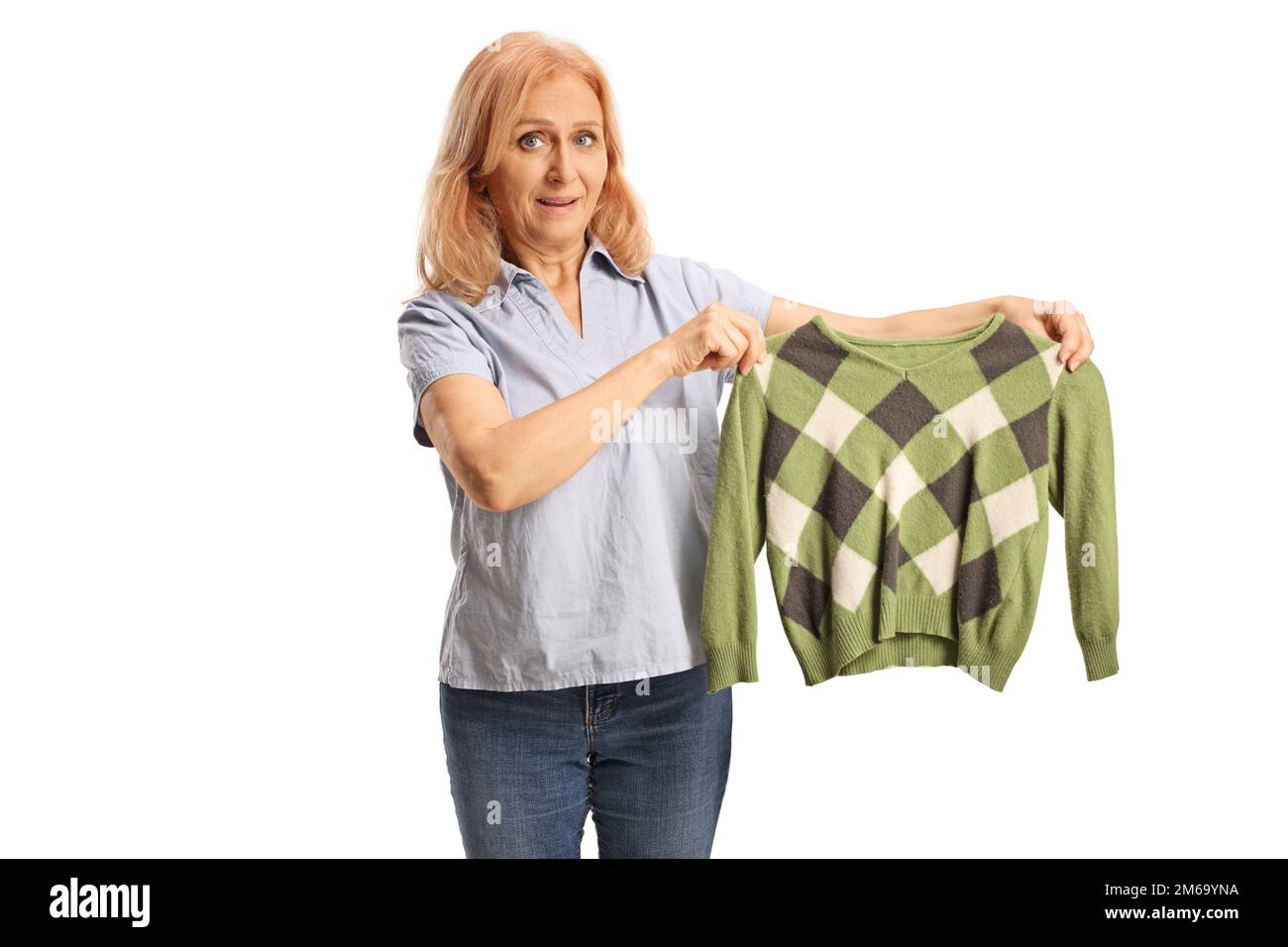 Upset Young Man With A Shrunken Blouse Stock Photo - Download