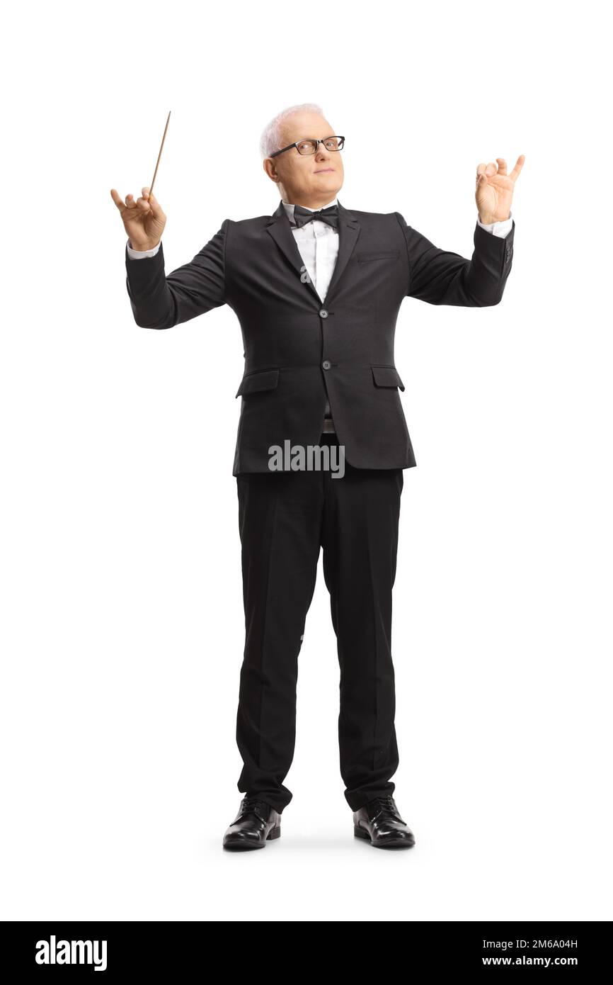 Full length portrait of a music conductor directing a performance isolated on white background Stock Photo