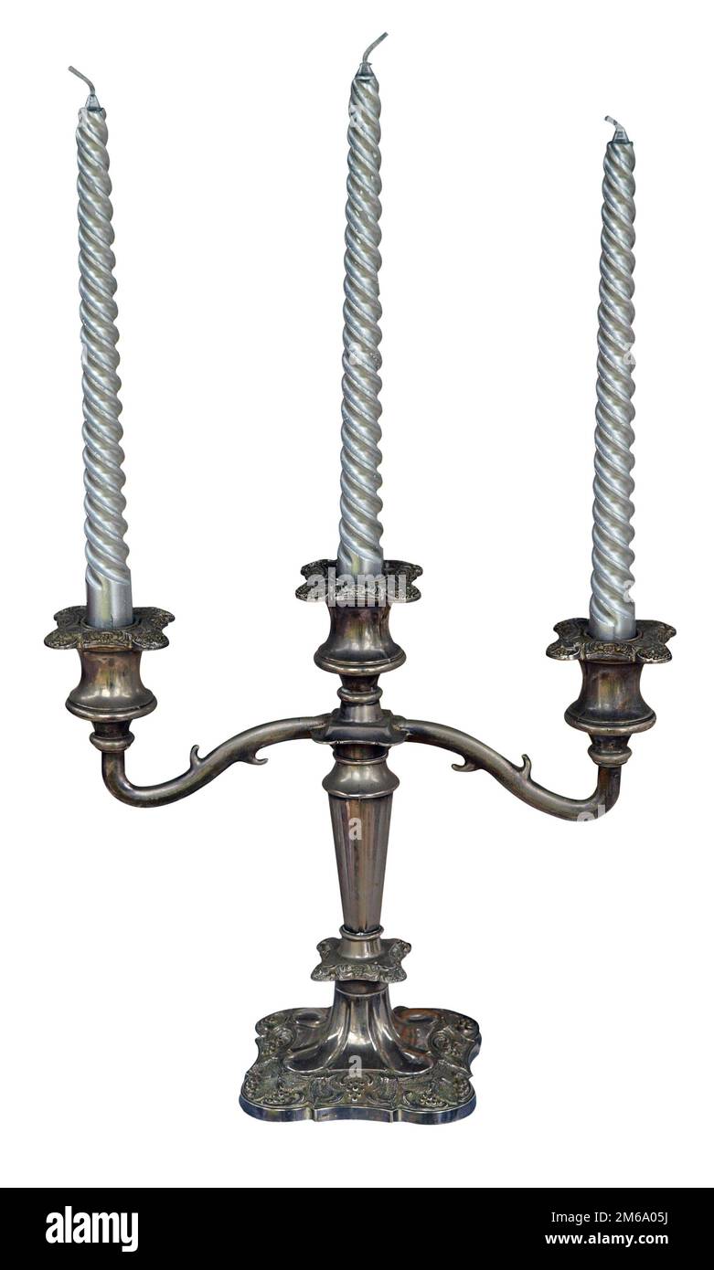 Three Silver Candles in a candle stick holder Stock Photo Alamy