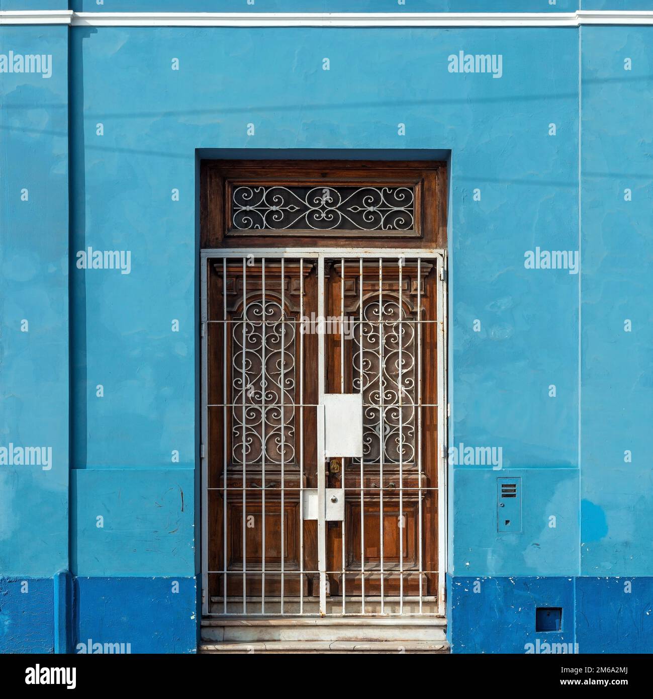 Blue colonial style facade with door, Potosi, Bolivia. Stock Photo