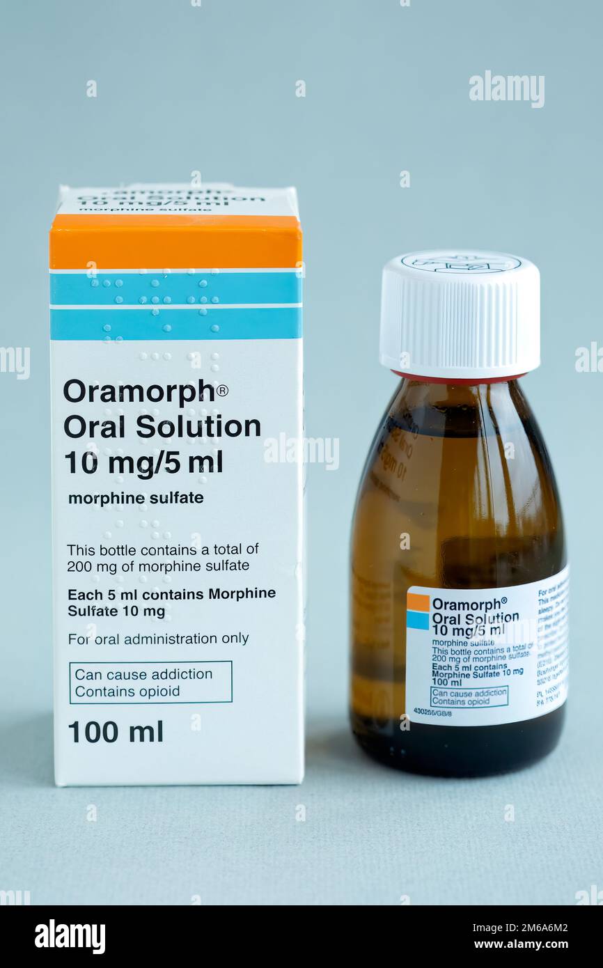 A bottle of Oramorph oral solution. A morphine based opiate painkiller medication prescribed in the uk to relieve moderate to severe pain Stock Photo