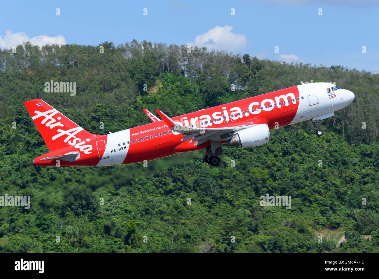 AirAsia Airbus A320 aircraft taking off. Airplane of airline Thai AirAsia departing HKT airport Aircraft A320ceo of Air Asia Thailand. Stock Photo