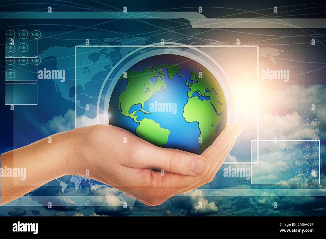 Hand holding globe in blue virtual interface Stock Photo