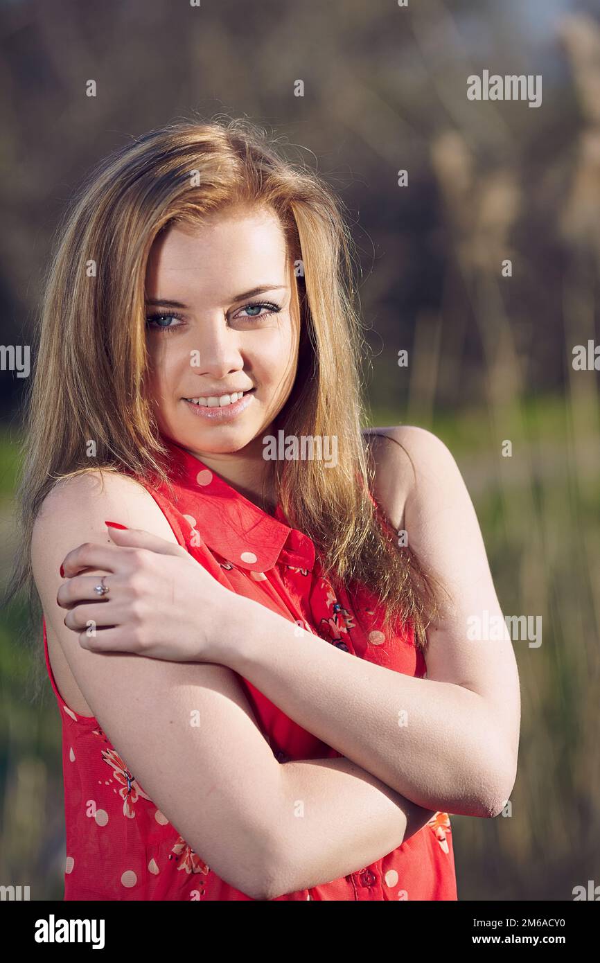 Girl on a background of reeds Stock Photo