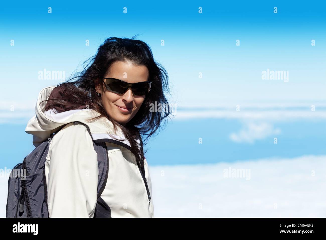 Cute Young Woman in High Mountain Range Stock Photo - Alamy