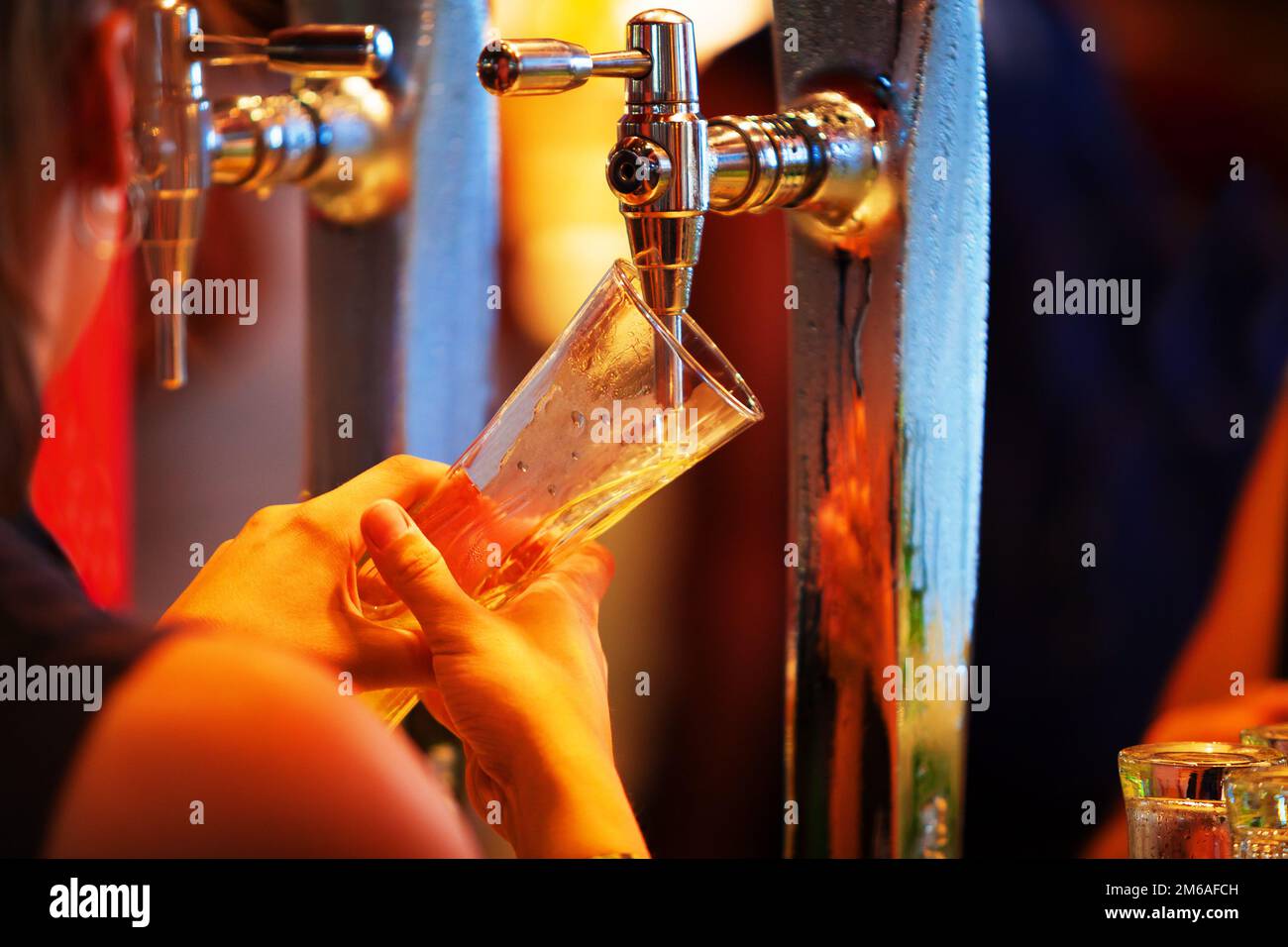 Pouring a Beer in Pub Stock Photo