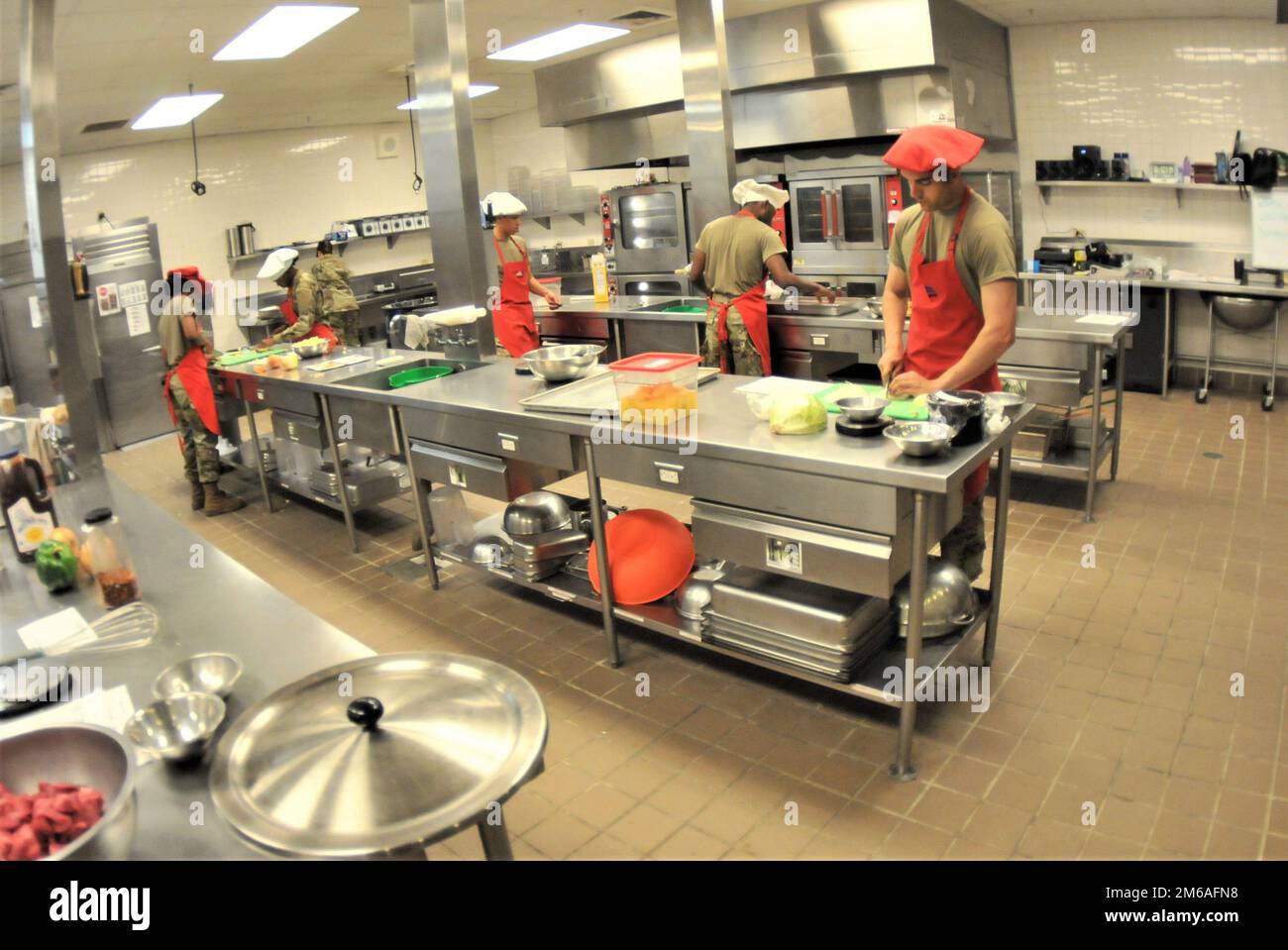 Air Force services specialist students work on basic food preparation during an April 27 training session in Fort Lee’s McLaughlin Hall. The Services Specialist Course also includes blocks of instruction on fitness and readiness. It graduates roughly 1,300 students yearly. Stock Photo