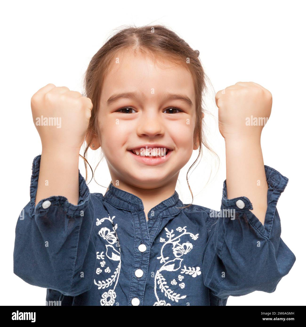 Little Girl with Winner Expression Stock Photo