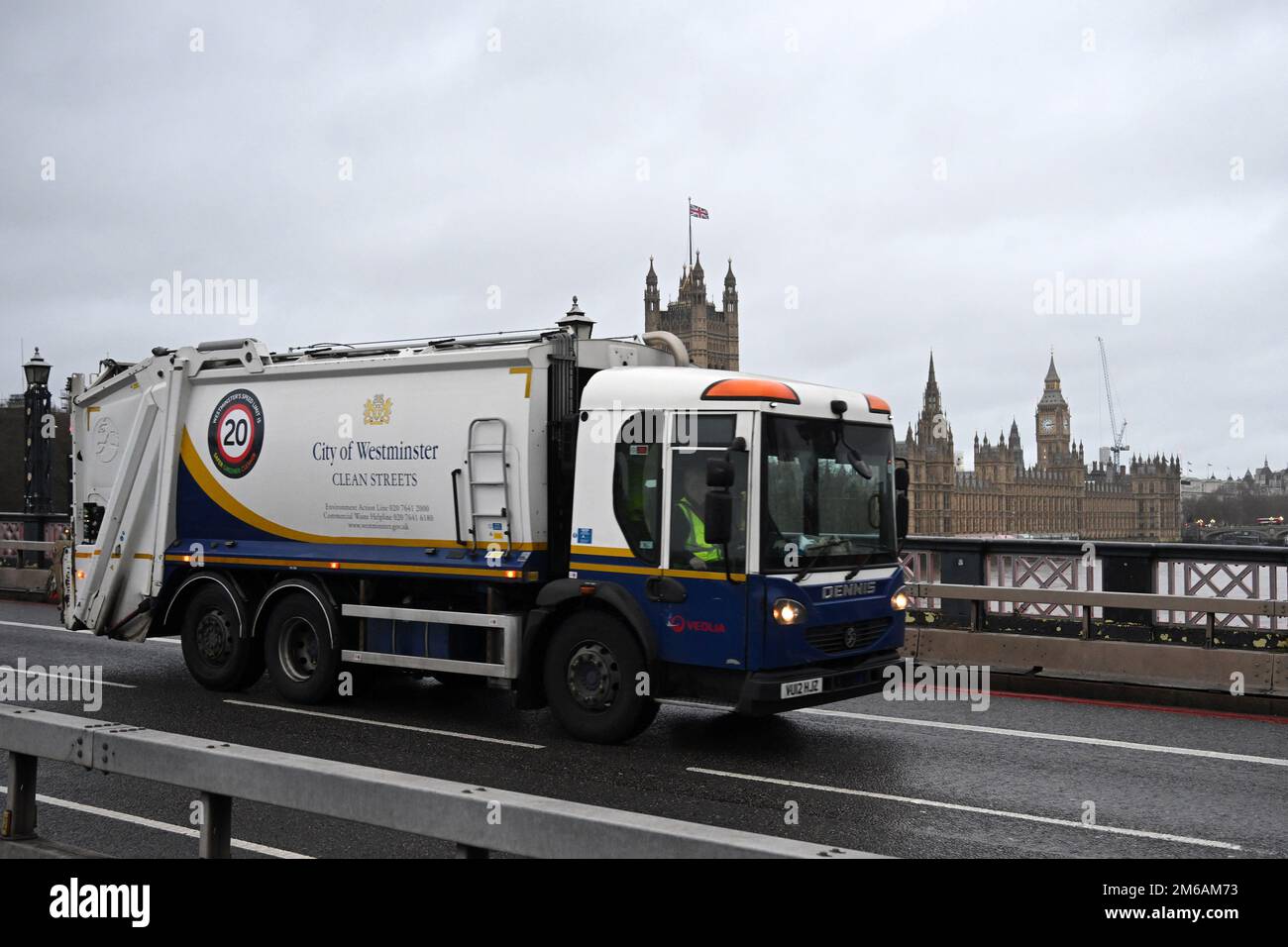 City of Westminster council bin lorry. Houses of Parliament and Big Ben
