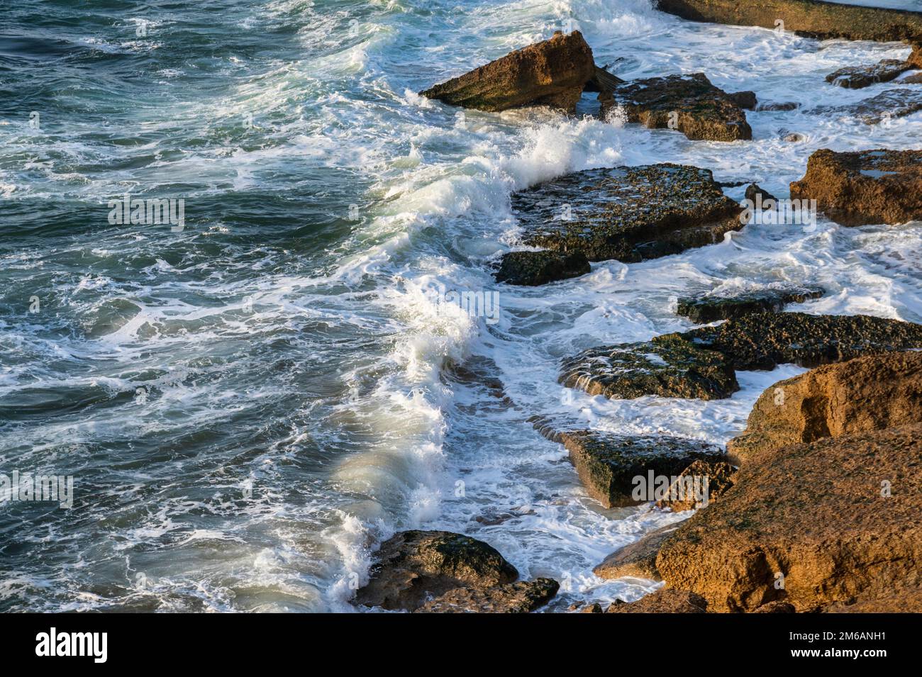 Big breaking Ocean wave on a beach Stock Photo