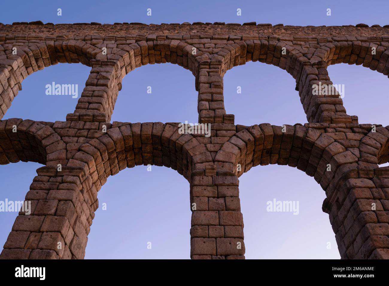 Detail of stone arches of Roman Aqueduct of Segovia, Segovia, Spain ...